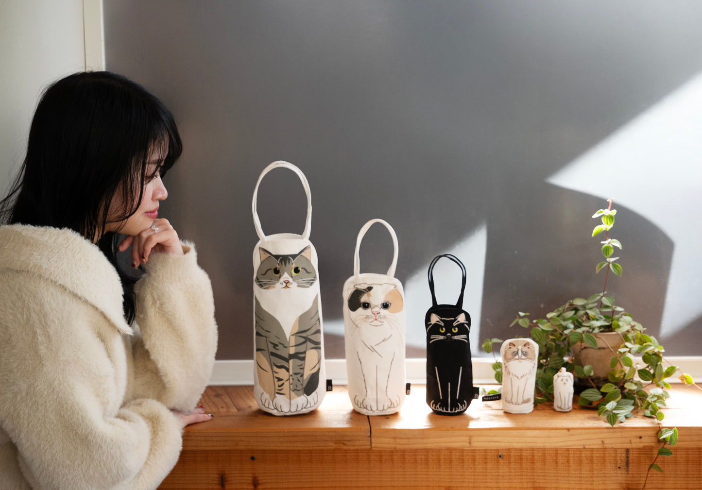 みんち🦦【# Z世代の味方】× ROOTOTE ネコリョーシカ